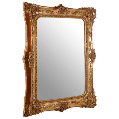 Decorative gold-framed mirror on a white background