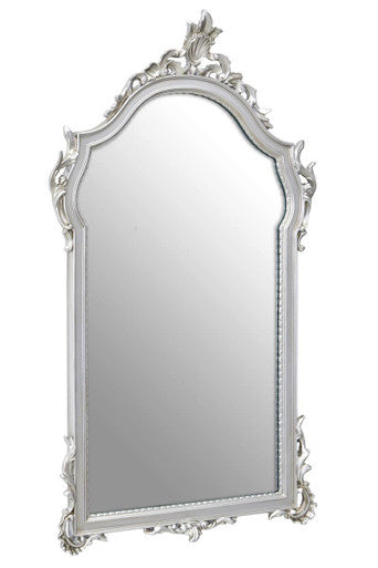 Decorative silver mirror with intricate frame on a white background