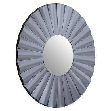 Round mirror with a sunburst design on a white background
