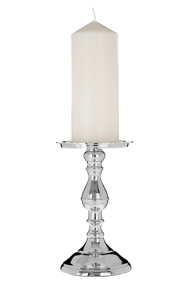 Silver candle holder with a white candle on a white background