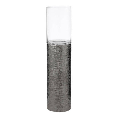 Clear glass candle holder with textured silver base on a white background