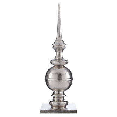 Decorative metal finial on a white background