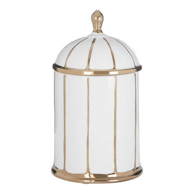 Decorative lamp with white glass and gold metal accents on a white background