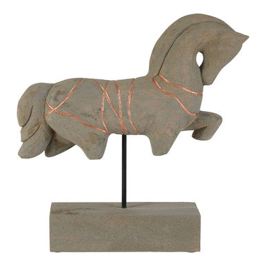 Decorative horse sculpture on a stand with a white background
