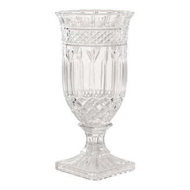 Clear glass vase with intricate patterns on a white background