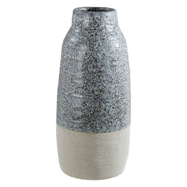 Decorative vase with two-tone design on a white background