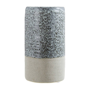 Two-toned cylindrical vase with speckled pattern on a white background
