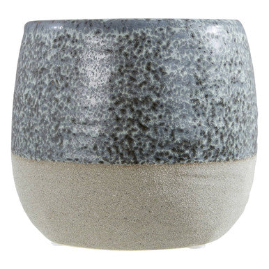 Ceramic pot with speckled gray top and beige bottom on a white background