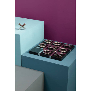 Stovetop on a blue platform with a purple wall background