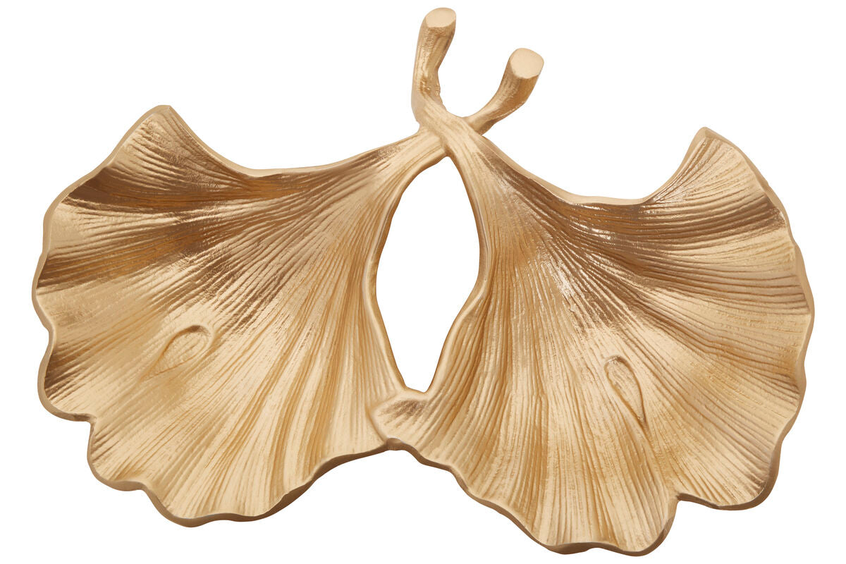 Gold leaf-shaped decorative item on a white background