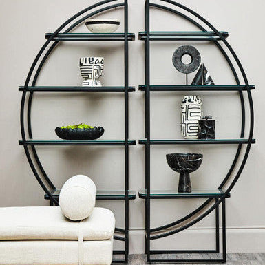 Modern wall shelf with decorative items in a room setting