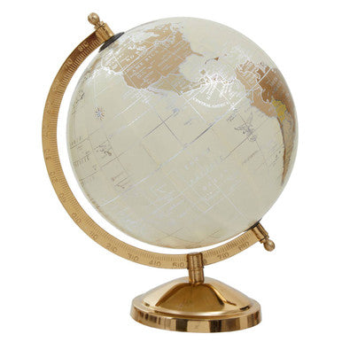 Decorative globe with gold stand on a white background