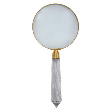 Magnifying glass with a decorative handle on a white background