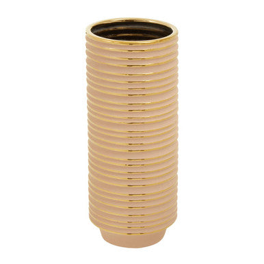 Gold ribbed vase on a white background
