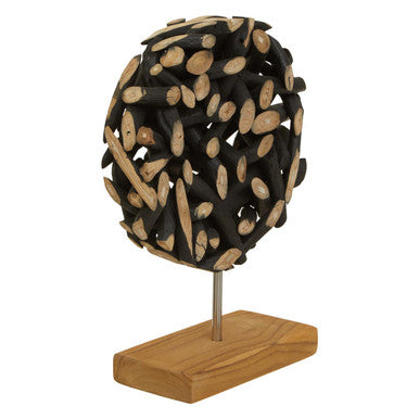 Wooden sphere sculpture on a stand with a white background