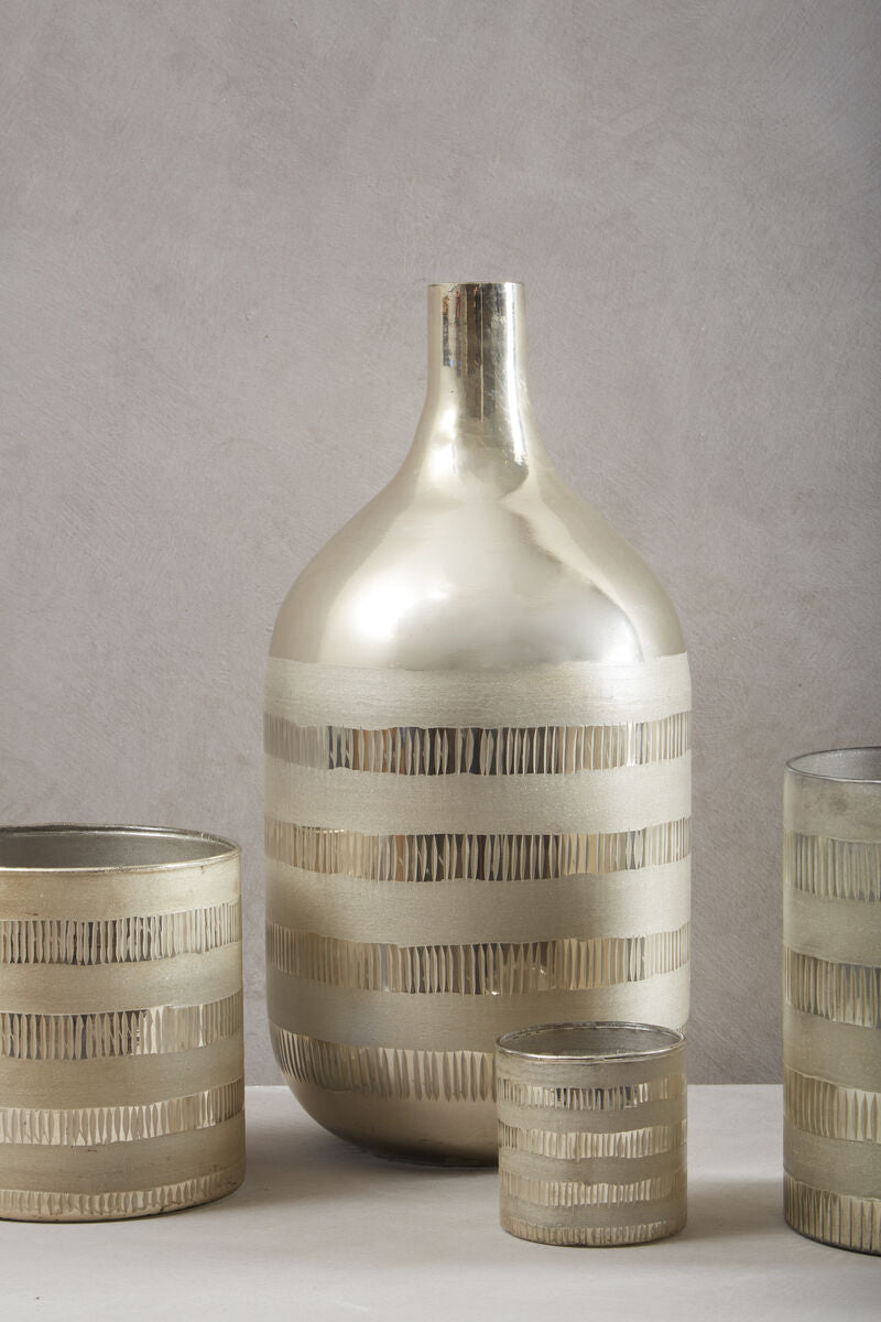 Set of decorative vases with striped patterns on a neutral background