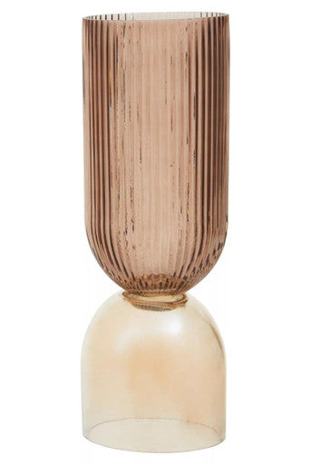 Wooden vase with ribbed design on a white background