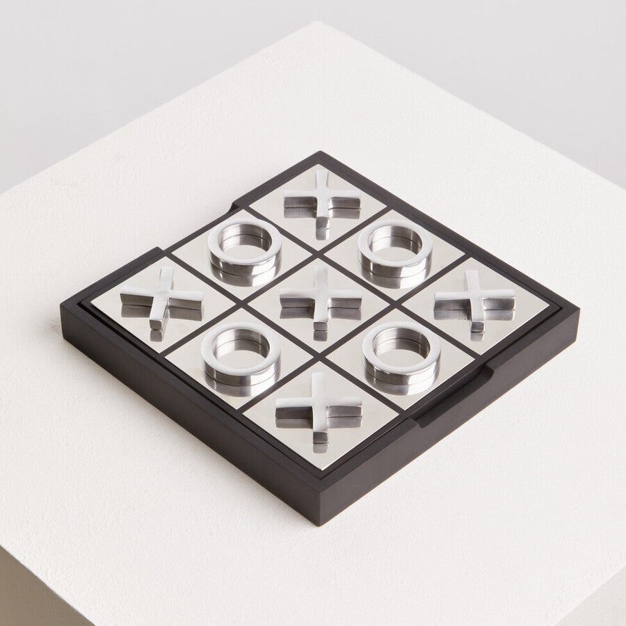 Metallic puzzle on a white surface
