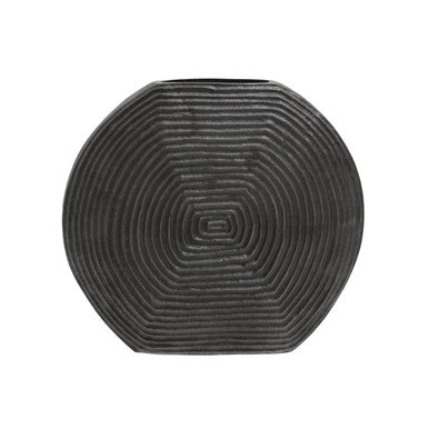 Black textured circular object on a white background