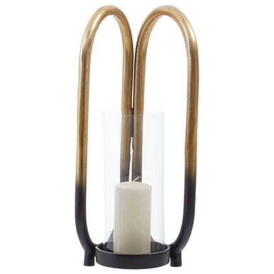 Decorative candle holder with a white candle inside on a white background
