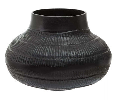 Black textured vase on a white background
