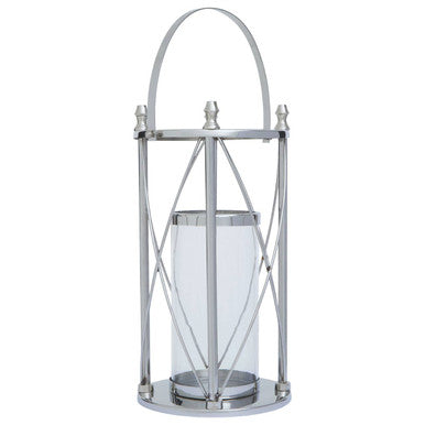 Decorative metal lantern with glass shade on a white background