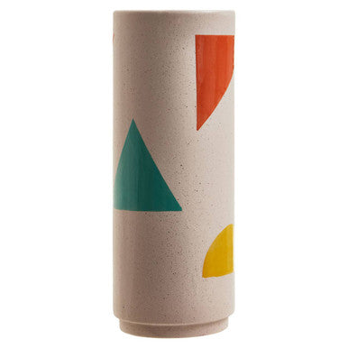 Cylindrical vase with colorful geometric patterns on a beige background