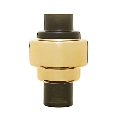 Gold and black cylindrical object on a white background