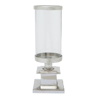Table lamp with white glass shade and silver base on a white background