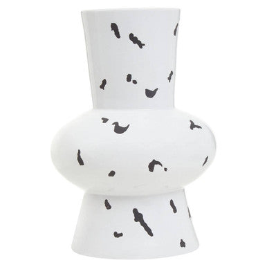 White vase with black abstract patterns on a white background
