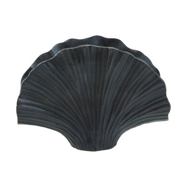 Black scallop shell on a white background