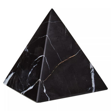 Black marble pyramid on a white background