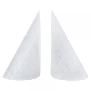 Two white paper party hats on a white background