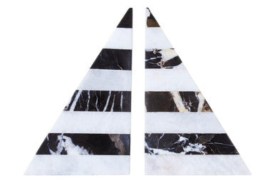 Pair of triangular earrings with black and white marble pattern on a white background