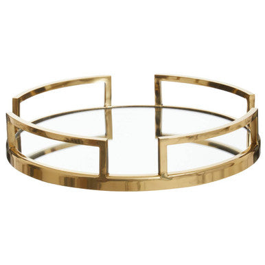 Gold circular tray with geometric design on a white background