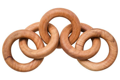 Wooden interlocking rings on a white background