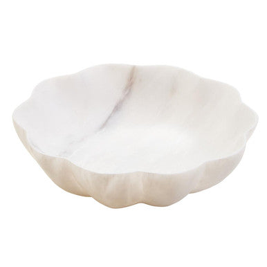 White ceramic bowl with a decorative edge on a white background