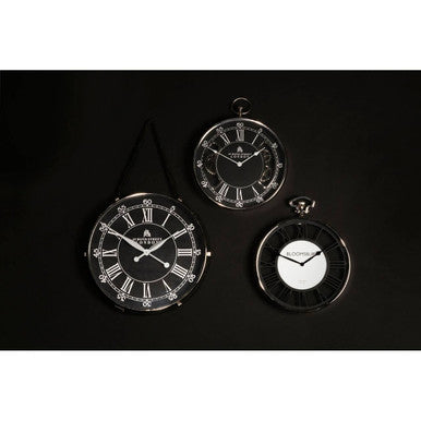 Three decorative clocks with Roman numeral faces on a black background