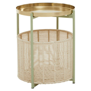 Side table with wicker basket and gold metal top on a white background