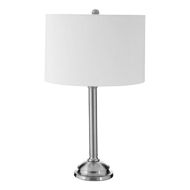 Table lamp with a white shade and silver base on a white background