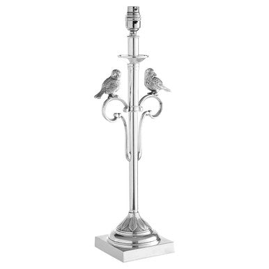 Decorative silver lamp base with bird designs on a white background