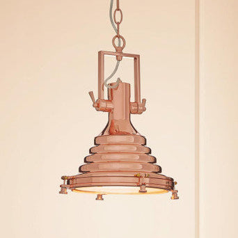 Vintage-style pendant light with a metallic finish on a beige background
