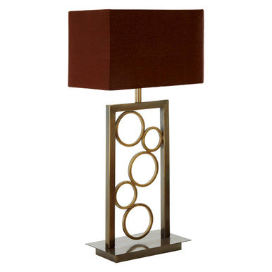 Table lamp with brown square shade and gold circular design on a white background