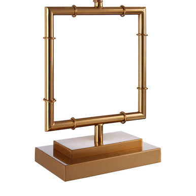 Gold decorative item with a rectangular frame and cylindrical elements on a white background