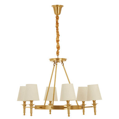 Gold chandelier with white lampshades on a white background