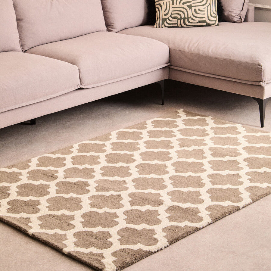 Sectional sofa with patterned cushions in a living room setting