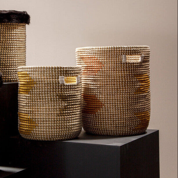 Set of woven baskets on a neutral background