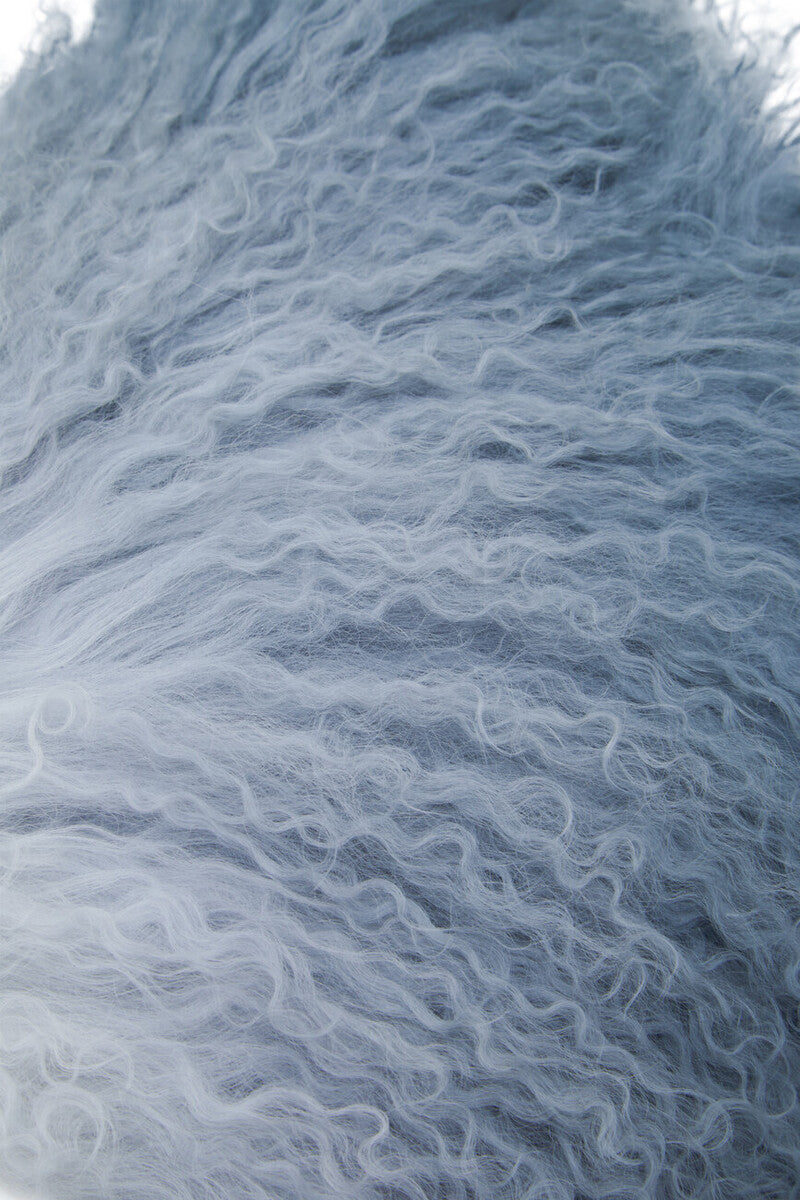 Close-up of textured white fabric with a wavy pattern