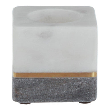 Square stone-like object with a gold accent on a white background