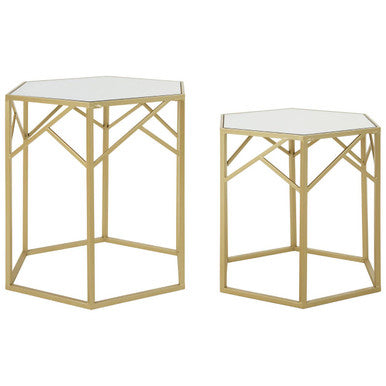 Two hexagonal side tables with gold frames and white marble tops on a white background